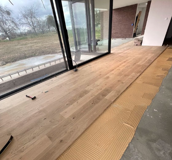 pose de parquet colle dans la province de liege