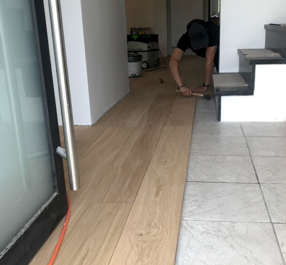 pose de parquet flottant sur carrelage a liege